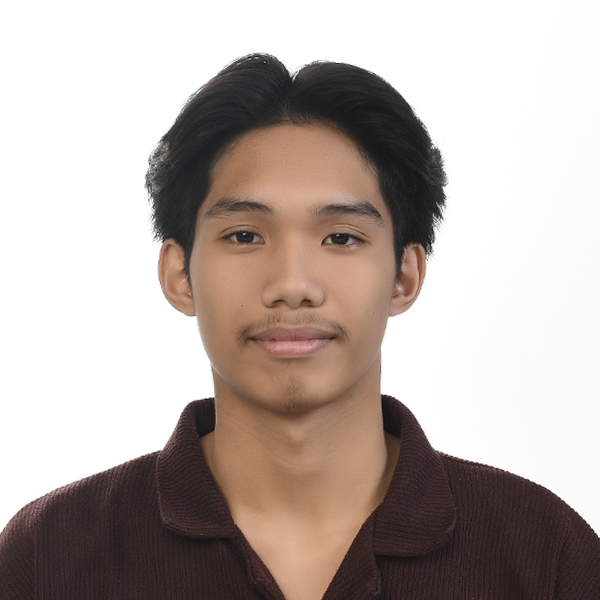 Ezekiel, a professional member of the Altselino support team, wearing a dark brown shirt.
