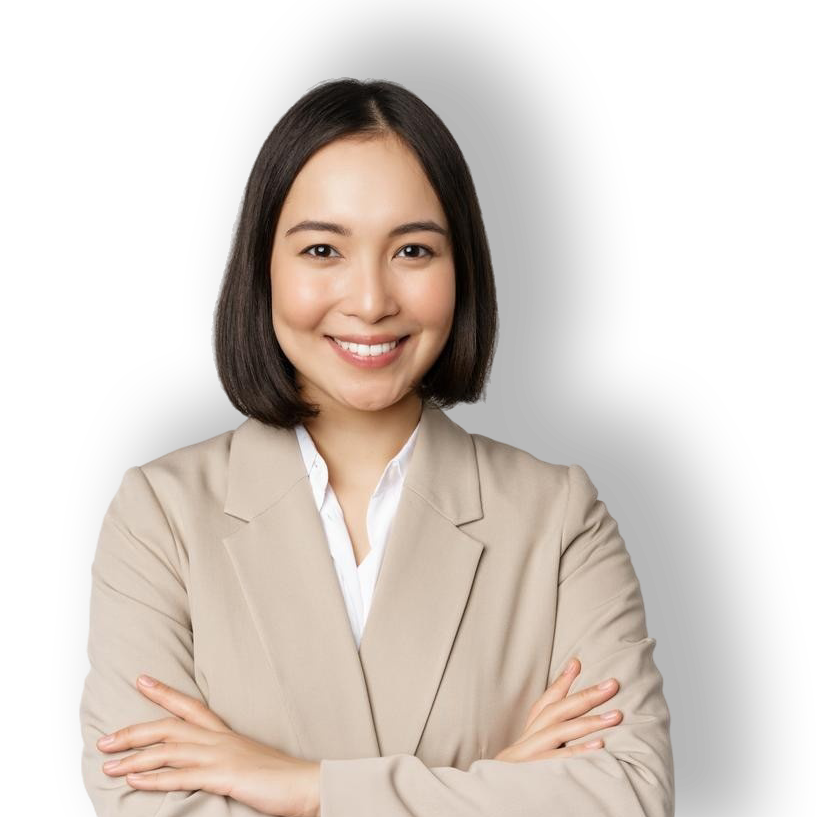 Female Professional Portrait Smiling Asian woman in a beige blazer with arms crossed.