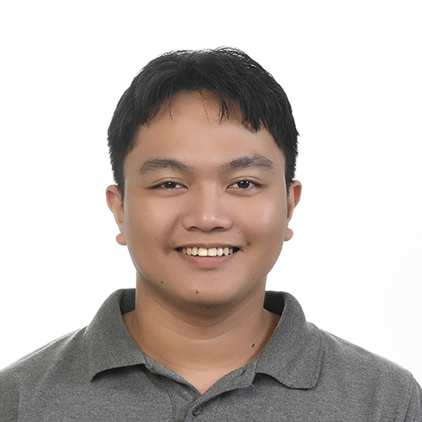 Kyle, a professional member of the Altselino support team, wearing a gray shirt.