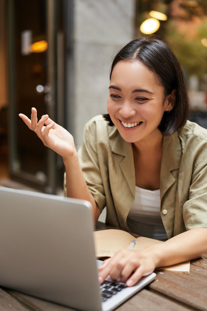 A cheerful Altselino specialist gesturing while on a video call with a client. Title: Altselino-Dynamic-Client-Consultation-Call