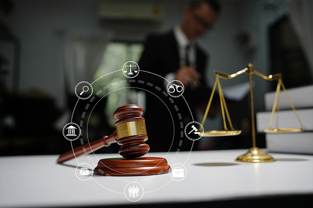 A legal gavel and scales of justice with digital legal research icons overlaying the image at Altselino.