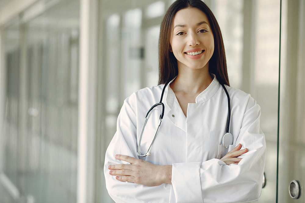 A female doctor in a white coat with a stethoscope, representing Altselino's medical expertise.