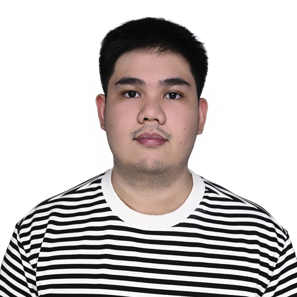 Rosh, a professional member of the Altselino support team, wearing a striped shirt.