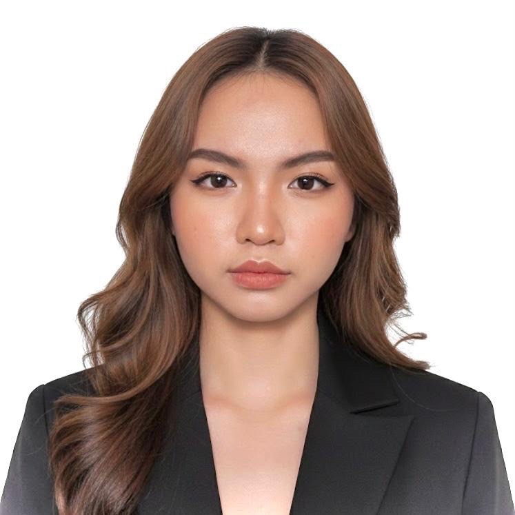 Loice, a professional member of the Altselino support team, wearing a black blazer and white blouse against a clean white background.